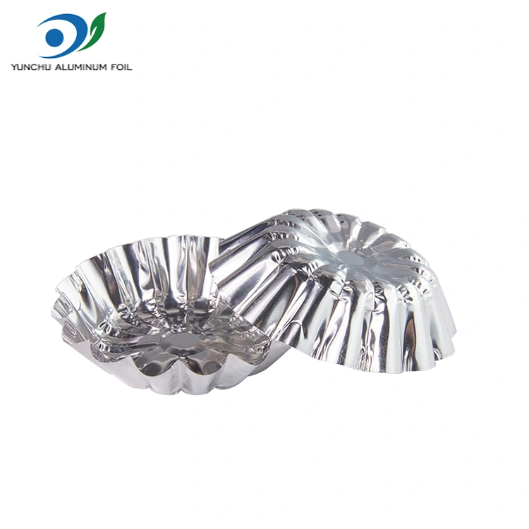 अंडे के टार्ट्स को एक एयर फ्रायर सिल्वर एल्यूमीनियम पन्नी फूड कंटेनर में बेक किया जाता है अंडे के टार्ट्स को एक एयर फ्रायर सिल्वर एल्यूमीनियम पन्नी फूड कंटेनर में बेक किया जाता है